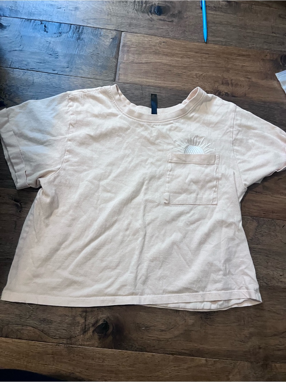 Size small light peach shirt